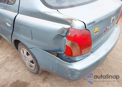 2002 Toyota Echo из США, поврежденный, VIN JTDBT123720237603